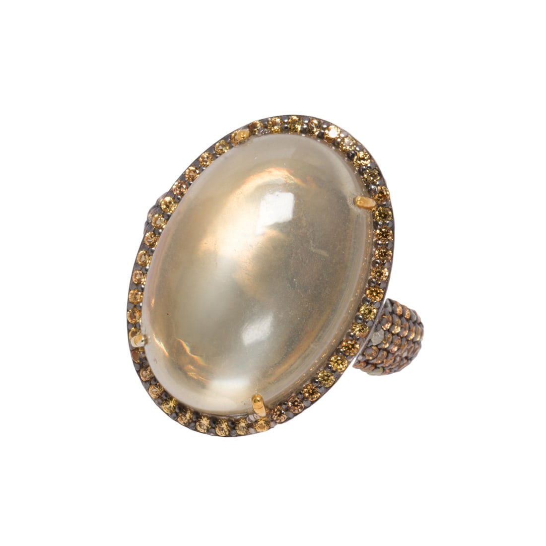 A moonstone, sapphire, diamond, silver, and 14k gold ring (1 of 1)