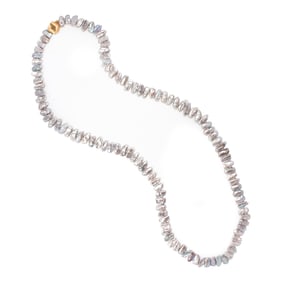 A freshwater keshi pearl and 14k gold necklace