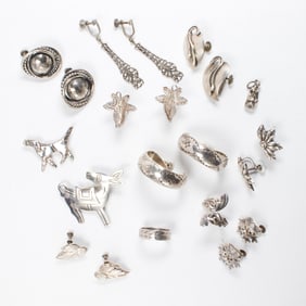 A group of silver jewelry