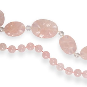 A group of rose quartz jewelry