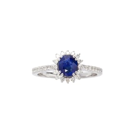 A sapphire, diamond and 14k white gold ring