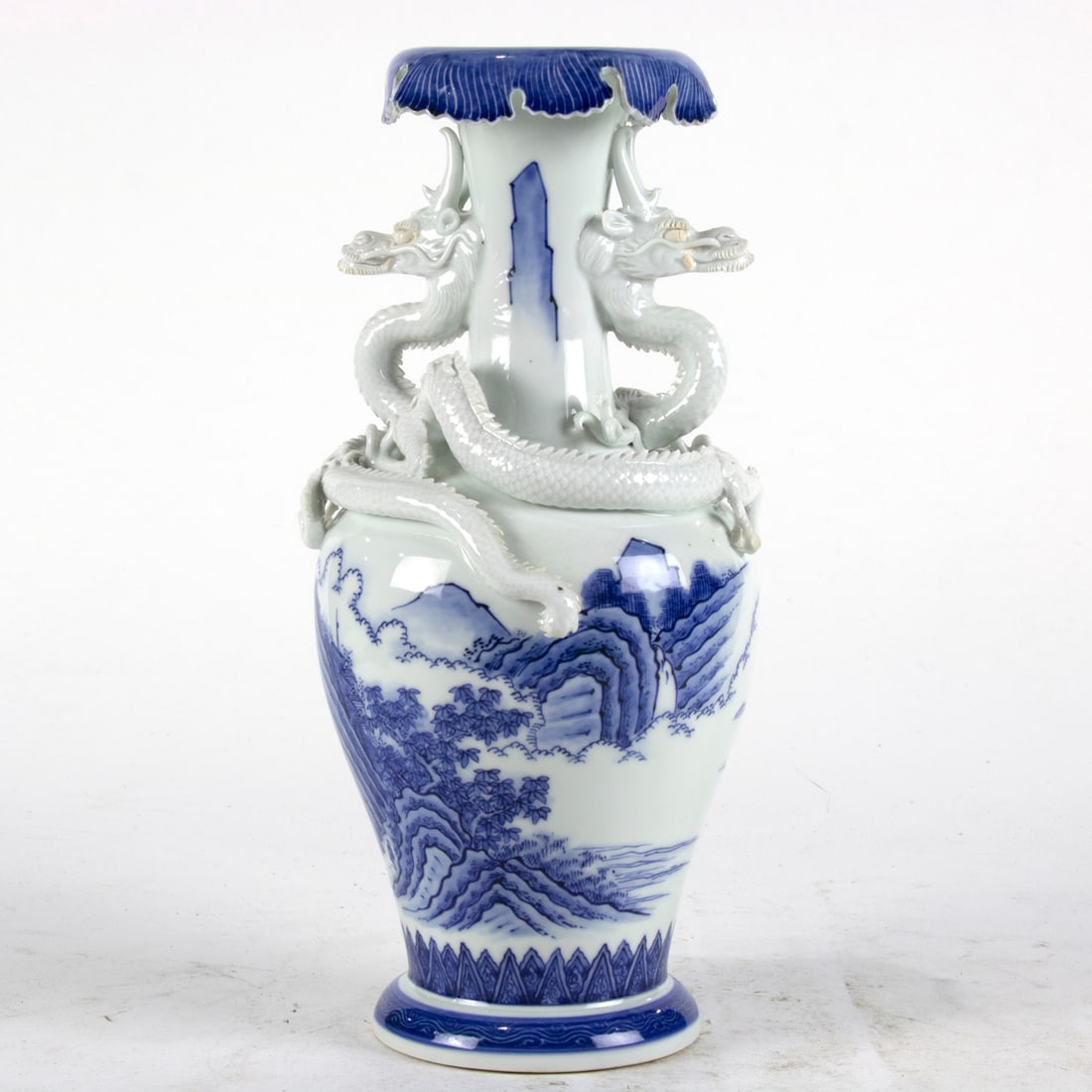 A Hirado blue and white 'dragon' vase: A Hirado blue and white 'dragon' vase. Meiji period, 14" high.
