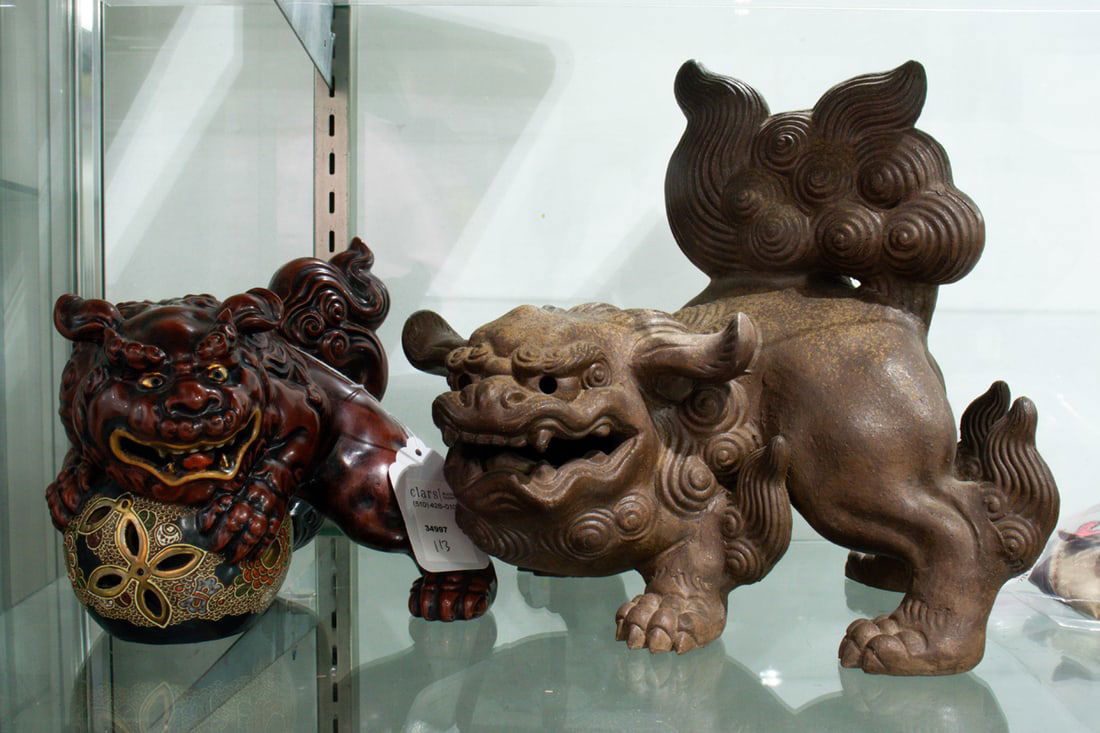 (lot of 2) Japanese ceramic shishi figures: (lot of 2) Japanese ceramic shishi figures. Meiji period, 8.5" and 12.25" wide.