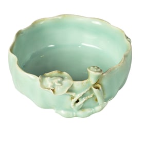 A Chinese celadon glazed 'lotus' brush washer