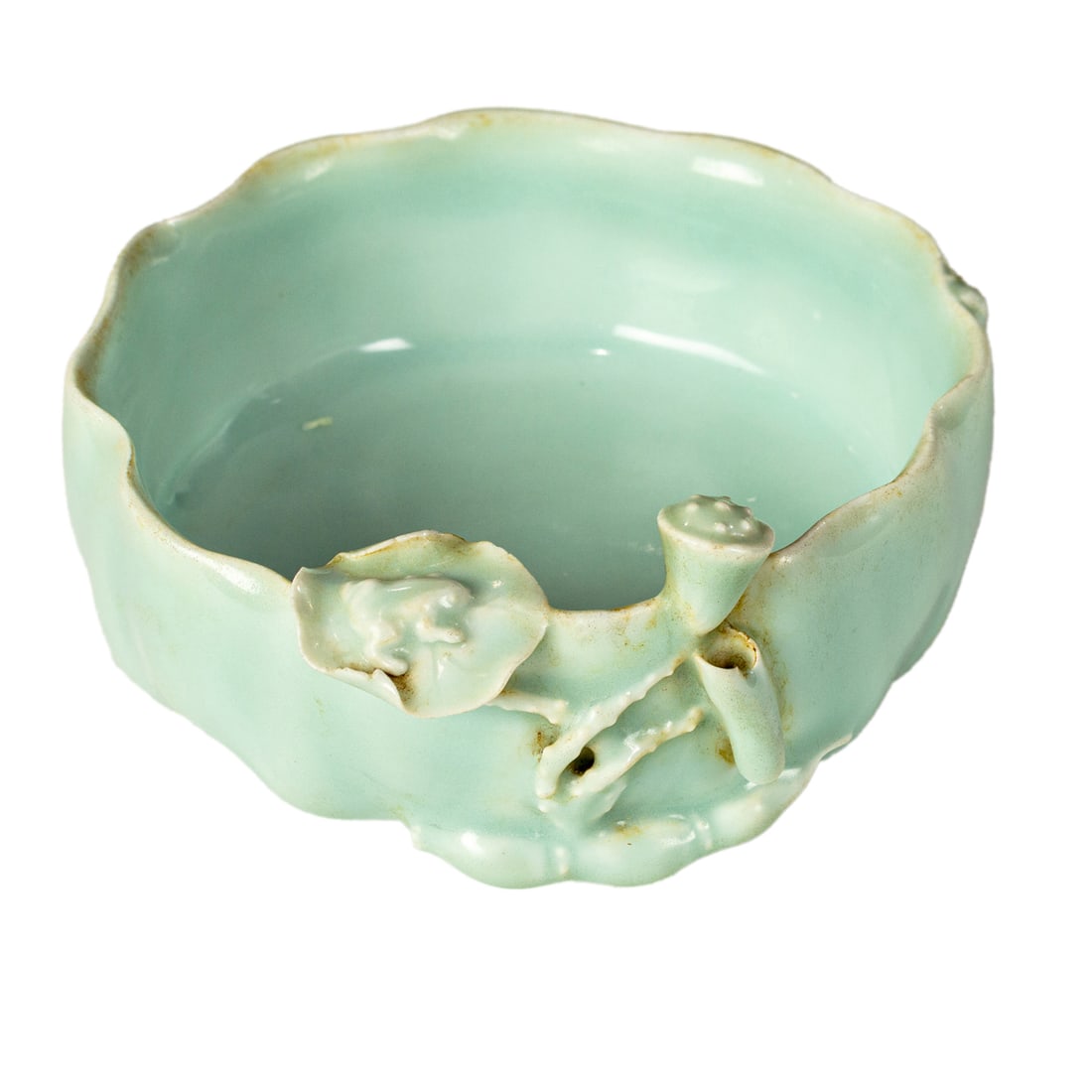 A Chinese celadon glazed 'lotus' brush washer: A Chinese celadon glazed 'lotus' brush washer. Modeled as an open lotus bloom with stem and leaves, bearing Qianlong four-character mark, 19th century, 4.5" across.