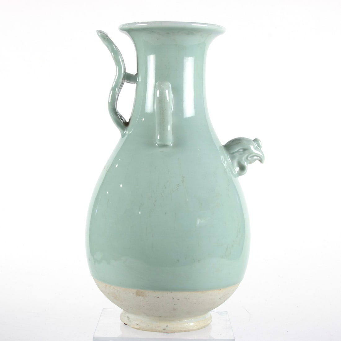 A Chinese celadon glazed vase: A Chinese celadon glazed vase. 13.25" high.