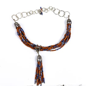 A multi-strand silver and glass bead necklace