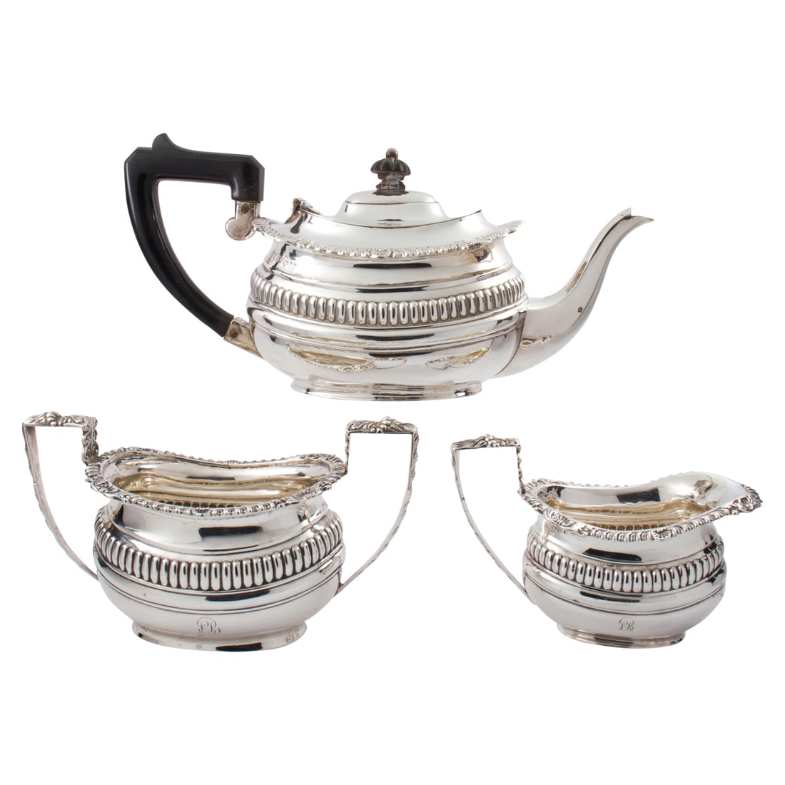 A three-piece English George Nathan and Ridley Hayes, Chester sterling tea service (1 of 4)