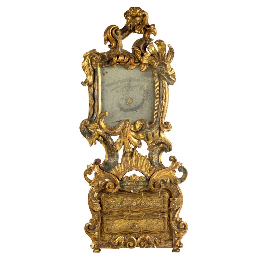 A Venetian Rococo polychrome and giltwood dressing mirror: A Venetian Rococo polychrome and giltwood dressing mirror, 18th century, the rectangular mirror set within pierced rocaille frame and cresting, over small cabinet inset with two simulated marble drawe