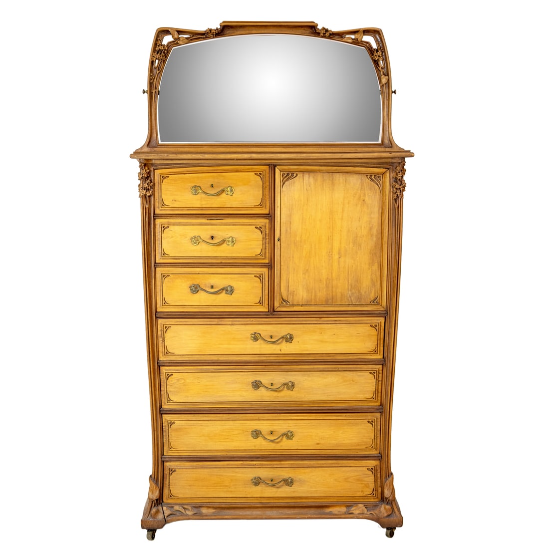 A Louis Majorelle (1859-1926) Art Nouveau standing chest with mirror: A Louis Majorelle (1859-1926) Art Nouveau standing chest with mirror, Nancy, circa 1900, the sinuous carved top with leaf and floral sides continuing to the tall case with seven drawers, all with orig