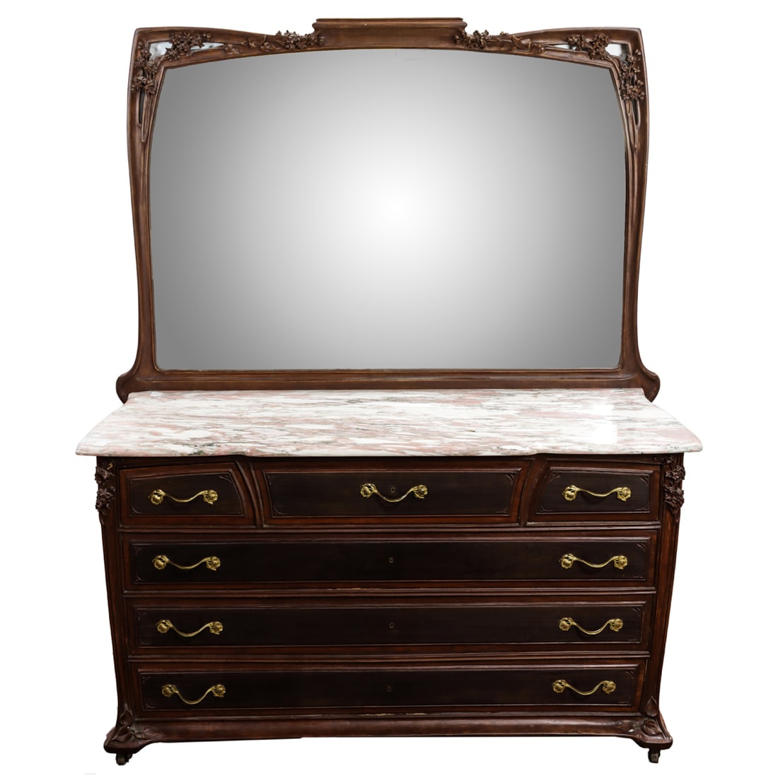A large Louis Majorelle mirrored chest circa 1900: A large Louis Majorelle mirrored chest circa 1900, the bevel mirror surrounded with carved floral and vine borders, the lower case retaining the original variegated marble top resting on the six drawe