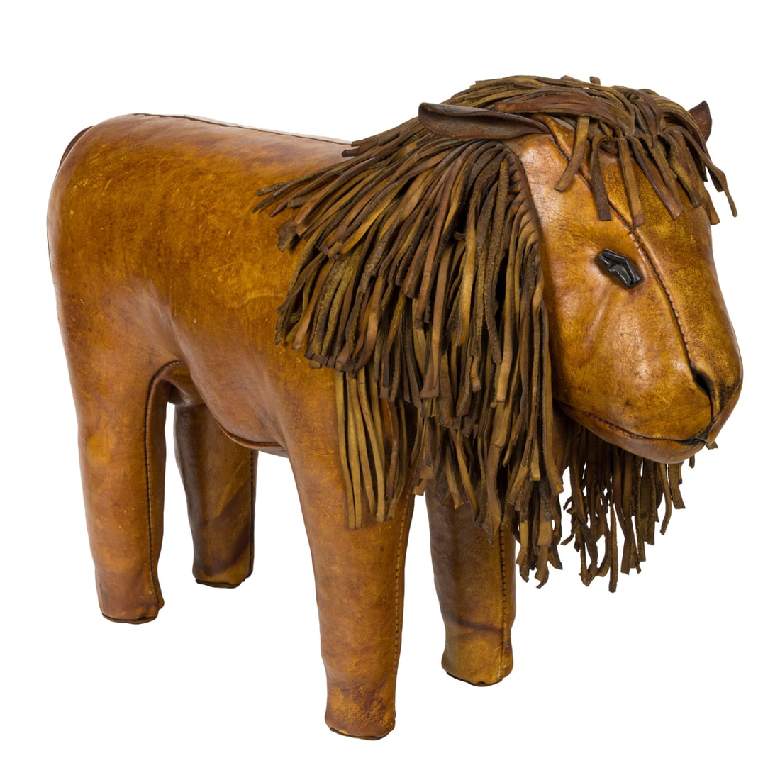 A Dimitri Omersa attrib. leather lion: A Dimitri Omersa attrib. leather lion, designed 1960 for Abercrombie and Fitch, 16"h x 22"l
