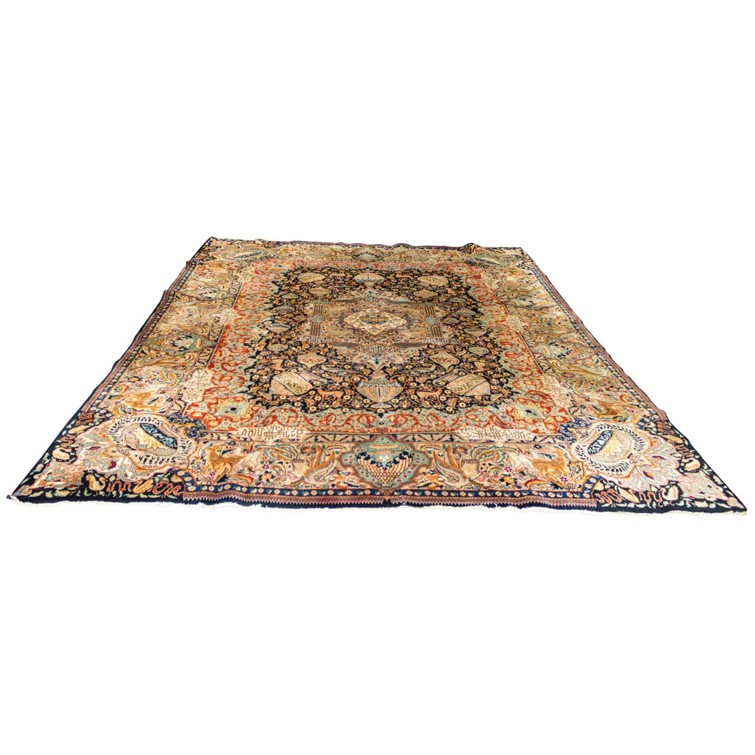 A Persian Kerman carpet (1 of 4)