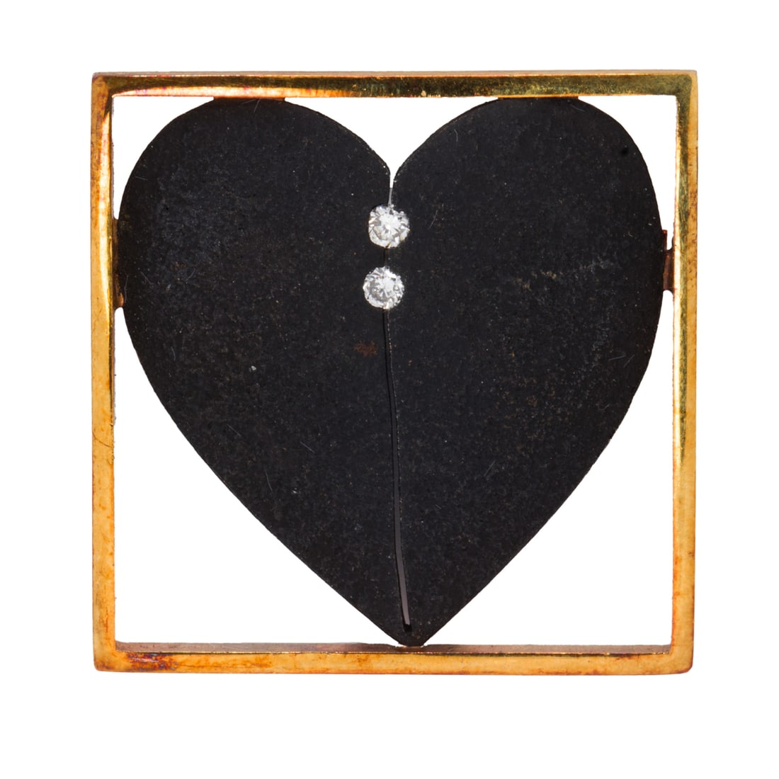 A diamond, metal, and 18k gold brooch: A diamond, metal, and 18k gold broochOf modernist design, designed as a metal heart within a square 18k gold frame, set with two round brilliant-cut diamonds; length: 1 1/4 in; 10.50 grams