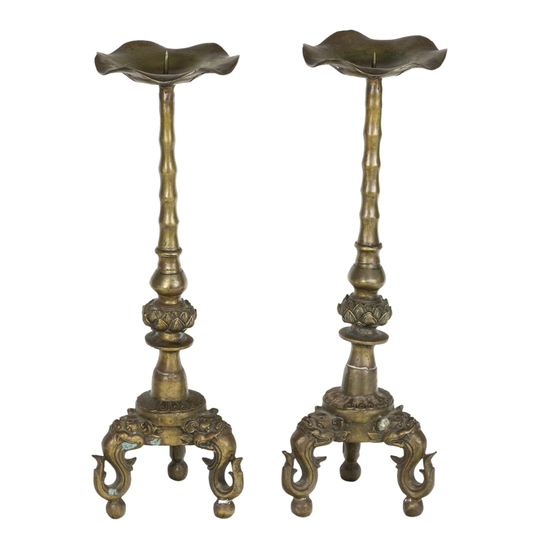 A pair of Chinese bronze candle prickets: A pair of Chinese bronze candle prickets. Featuring lotus design, Republic period, 16" high.