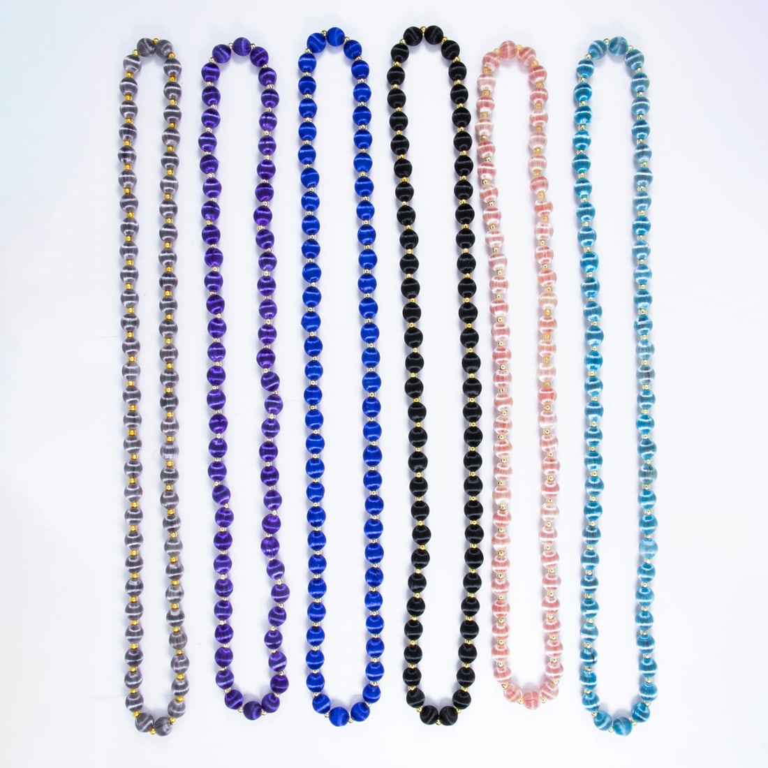Six silk beaded necklaces: Six silk beaded necklaces Comprising six beaded necklaces of a variety of colors; gross weight: 235.00 grams