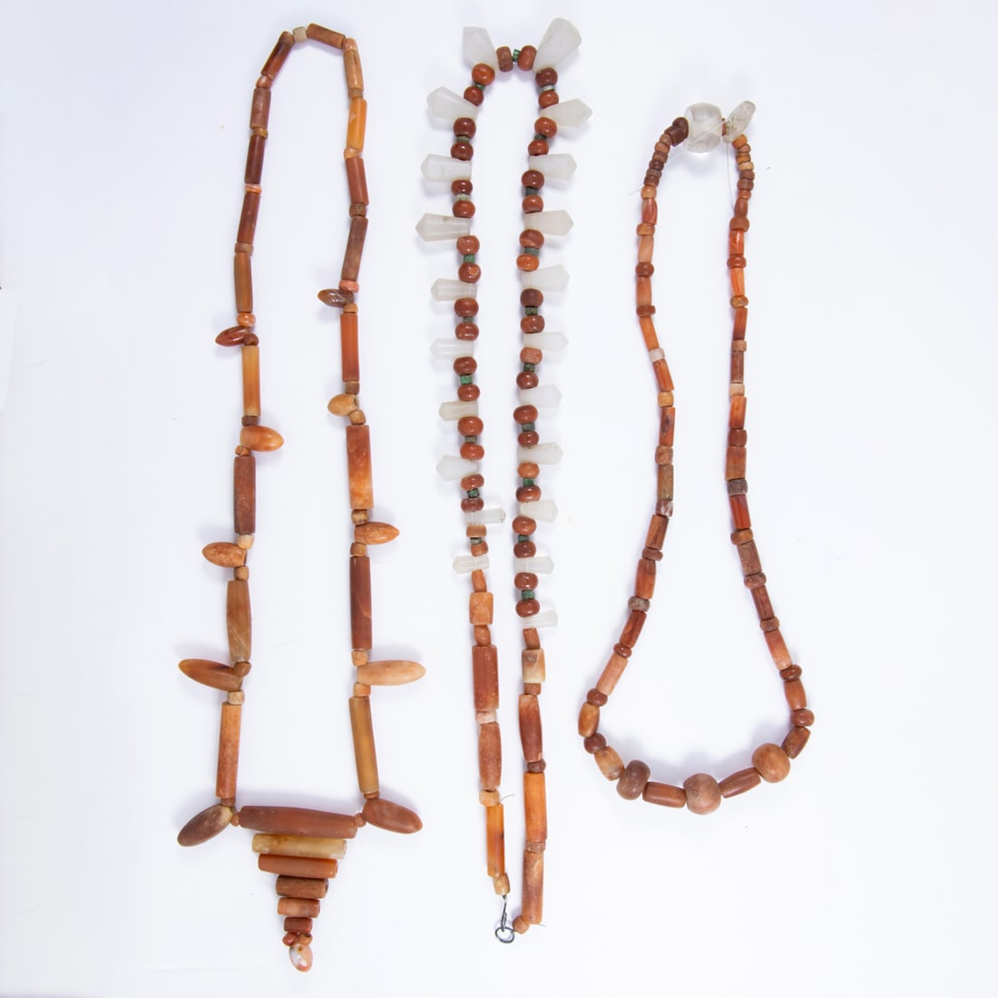 Three calcite and quartz beaded necklaces: Three calcite and quartz beaded necklaces Designed with calcite and quartz beads of varying shapes and sizes; gross weight: 11.10 ounces