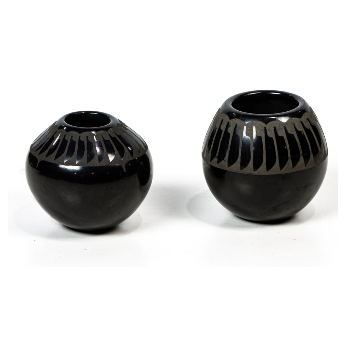 Two Denny Gutierrez Santa Clara pueblo pottery vessels (1 of 1)