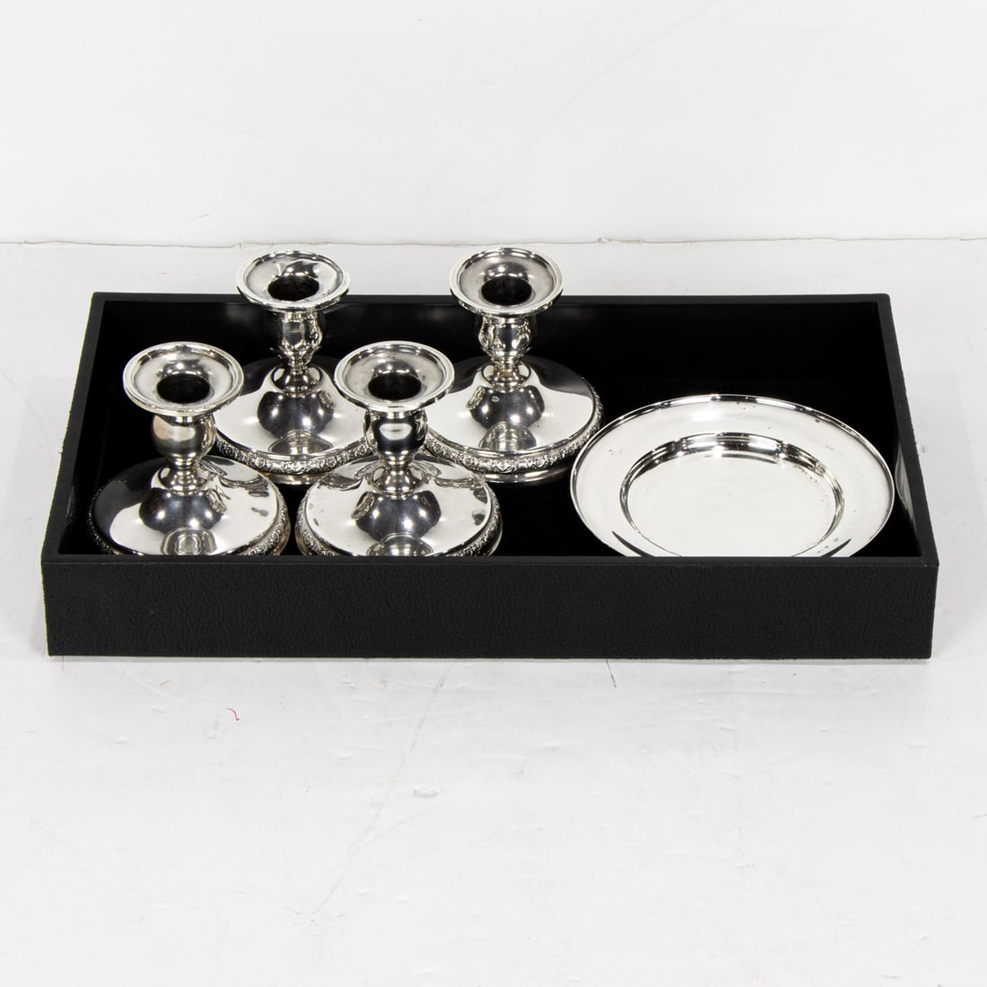 Two pairs of weighted International sterling candlesticks (1 of 2)