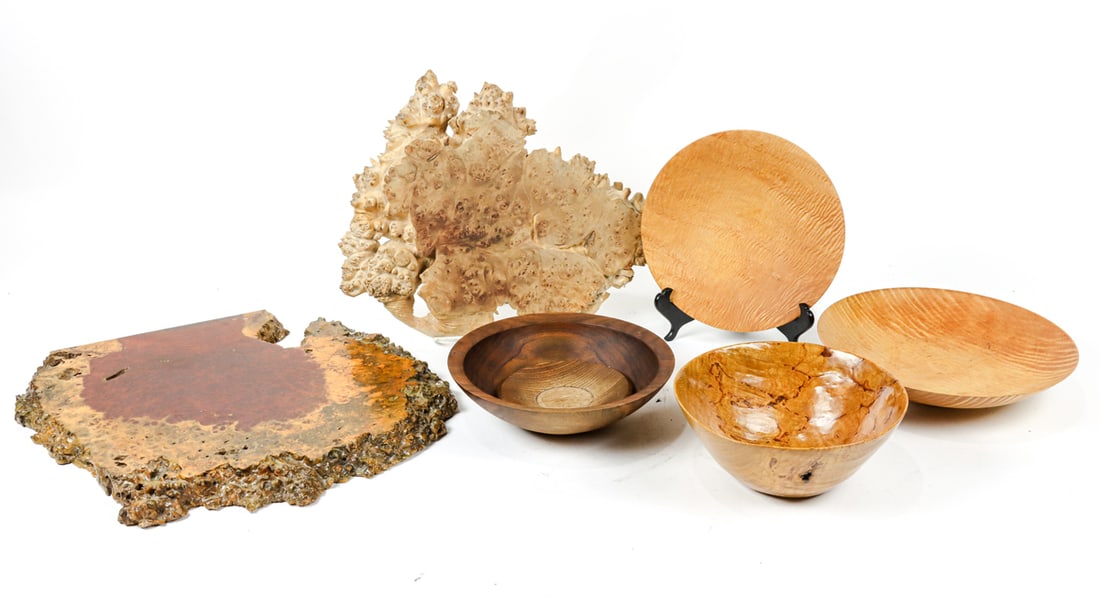 A group of studio wood vessels and trays: A group of studio turned wood vessels, comprising David Lory oak burl bowl, 1986, 4"h x 9"dia; Tom Sherwood curly maple low bowl, 1988, 11.5"dia; W. Frost curly maple plate, 10"dia; David Lancaster bo