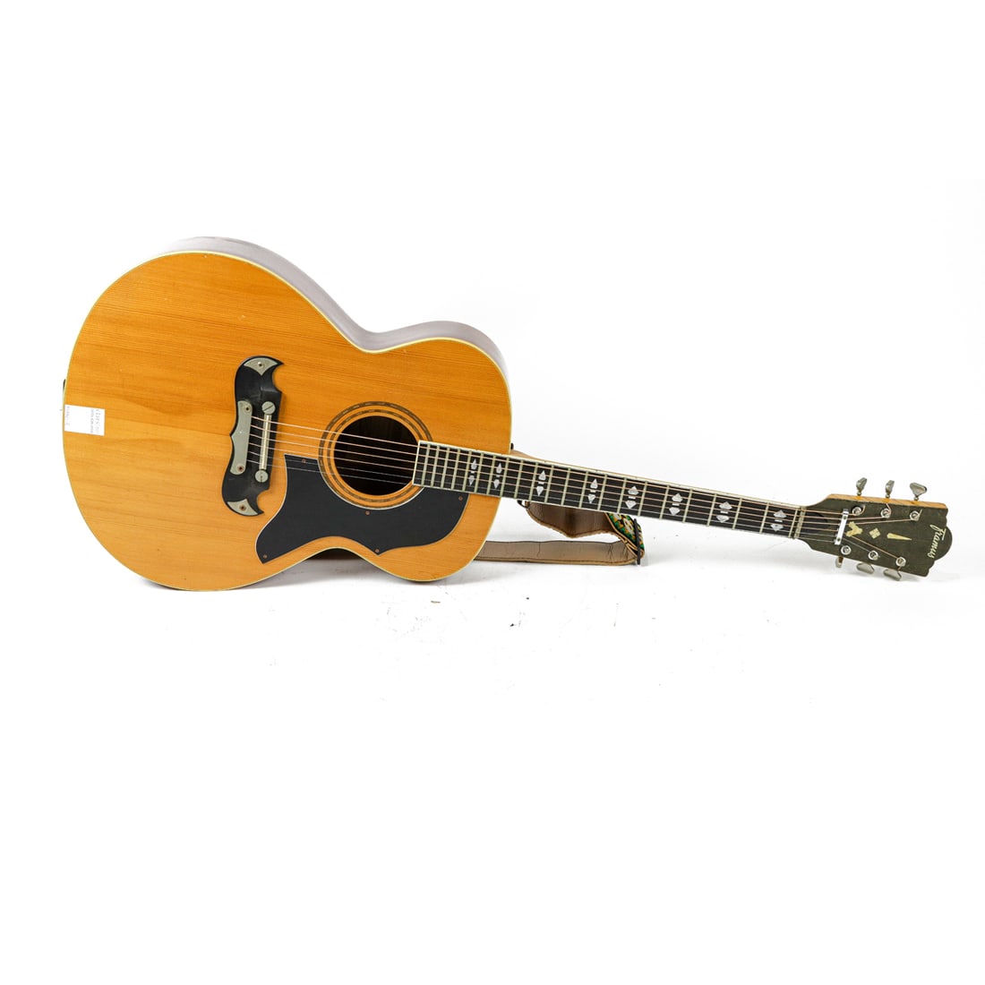 A German Framus acoustic guitar: A German Framus acoustic guitar, serial 67313, detailed with mother-of-pearl inlay, 41.75"l
