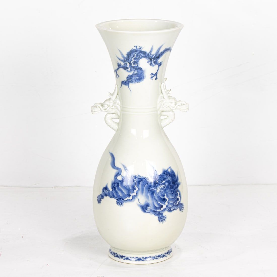A Hirado blue and white 'dragon' vase: A Hirado blue and white 'dragon' vase. Meiji period, 13.625" high.