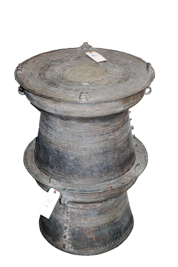 A pair of Southeast Asian bronze rain drums: A pair of Southeast Asian bronze rain drums. 20th century, 17"h x 24"w