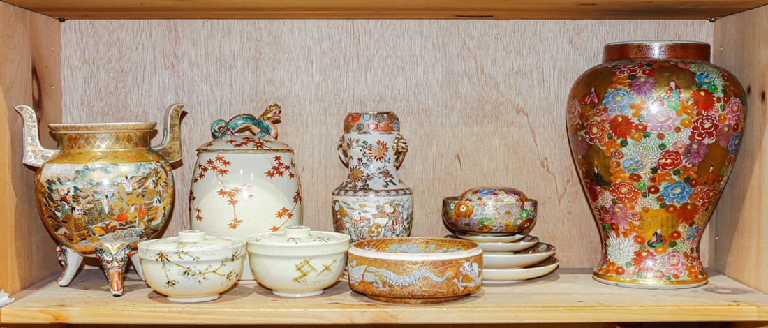A shelf of Satsuma objects: A shelf of Satsuma objects. Meiji period and later, 11.75" tallest.