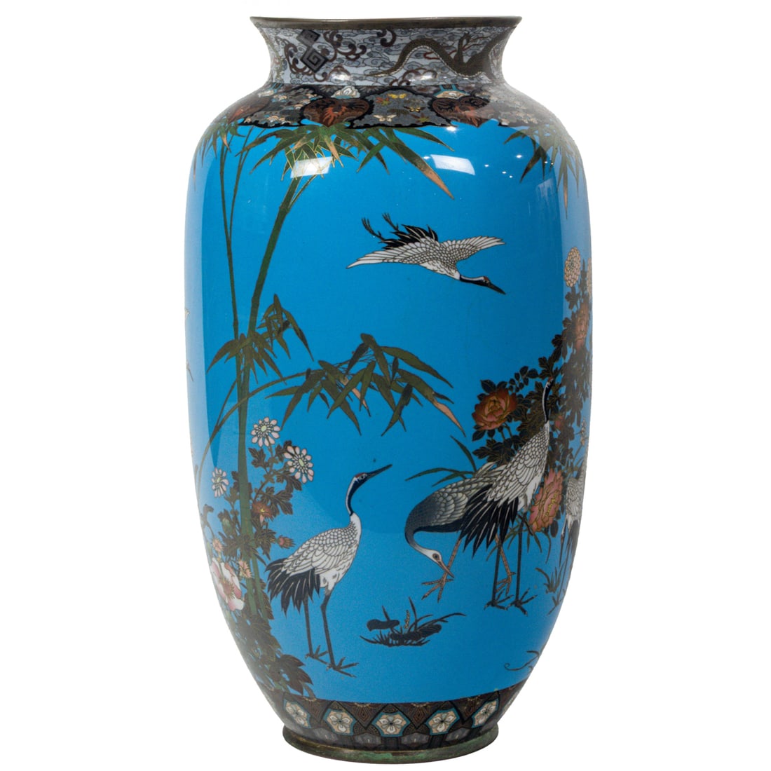 A Japanese cloisonne enamel 'crane' vase: A Japanese cloisonne enamel 'crane' vase. Of baluster form with a flaring mouth, painted cranes and floral motif against a turquoise ground, Meiji period, 18.125" high.