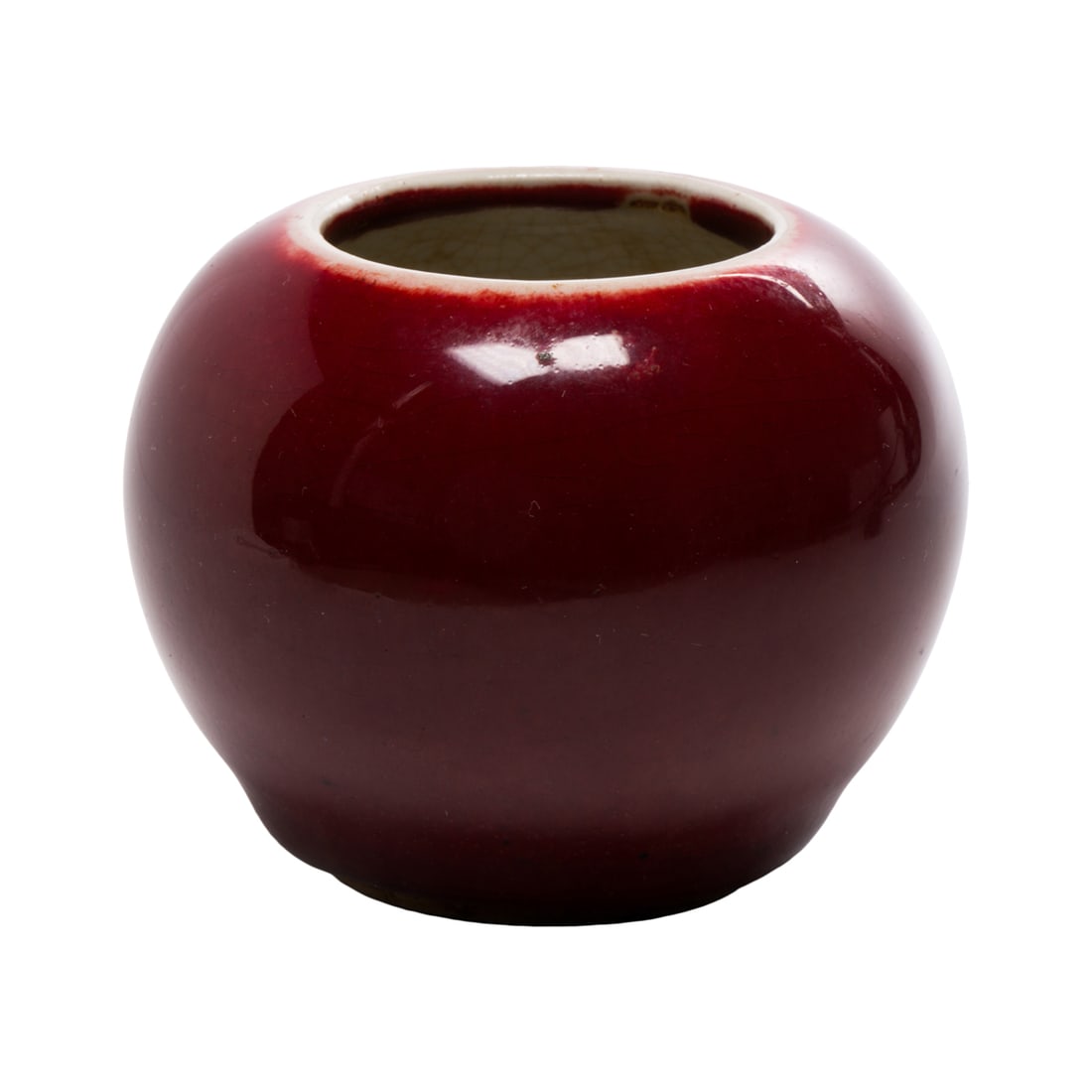 A Chinese oxblood glazed water coupe: A Chinese oxblood glazed water coupe. Qing dynasty, 2.125" high.