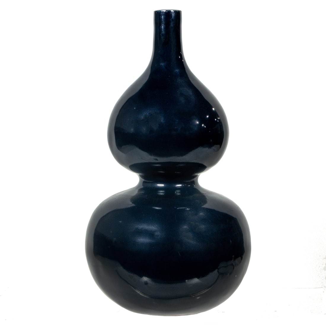 A Chinese blue glazed double gourd vase (1 of 3)