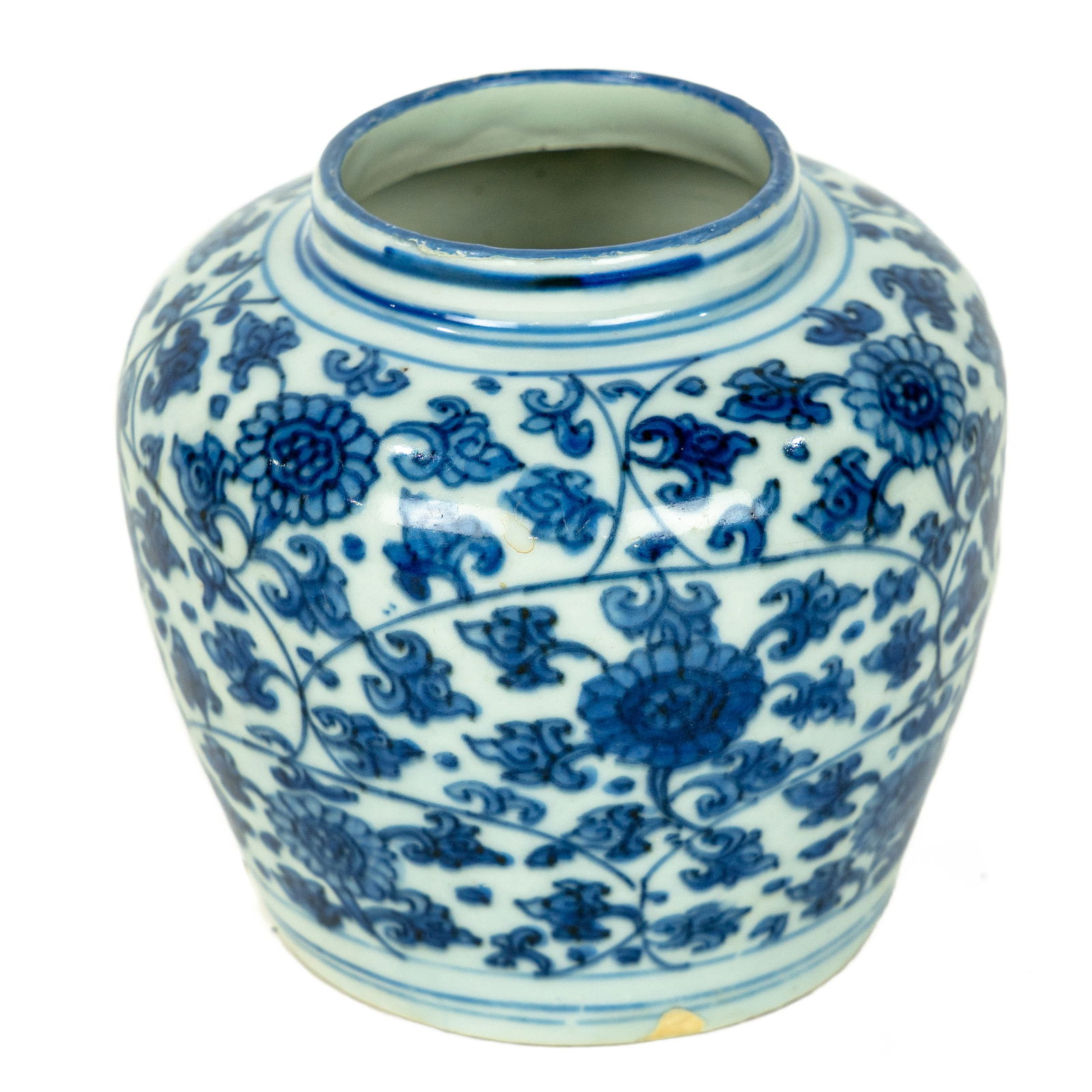 A Chinese blue and white jarlet: A Chinese blue and white jarlet. Featuring a scrolling floral and foliage motif, 16th/17th century, 4" high.