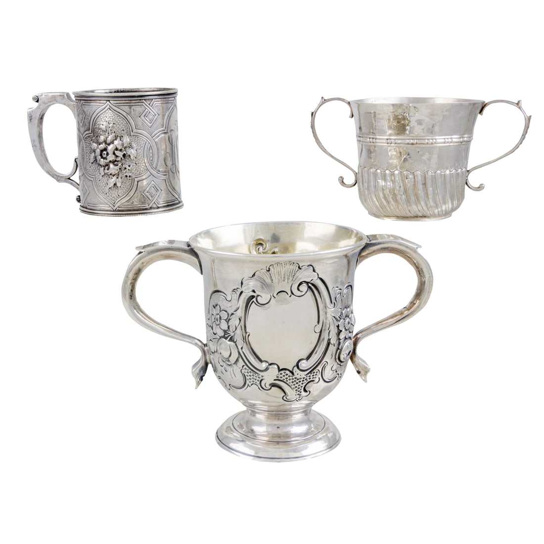Three Pieces of English, American & Irish Sterling and Coin Silver: Three Pieces of English, American & Irish Sterling and Coin Silver. The Georgian porringer , 3"h. The coin silver cup monogrammed 'MLS' retailed by J.W. Tucker & Co, 3.5"h. The largest repousse cup, E