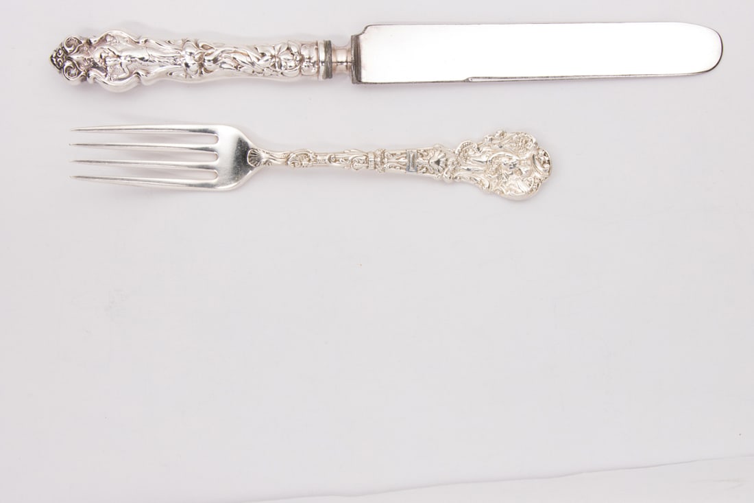 Gorham Versailles and Irian pattern flatware with Five Whiting Dinner Forks: Gorham Versailles and Irian pattern flatware with Five Whiting Dinner Forks. Comprising (6) forks in the Gorham Versailles pattern, 6.75"; (5) Whiting Aesthetic sterling dinner forks, 7.125"; (6) dinn