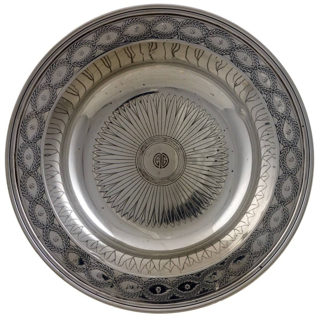 A Tiffany Sterling Center Bowl with laurel wreath border: A Tiffany Sterling Center Bowl with laurel wreath border. Monogrammed 'EG' to interior, 2.25"h x 11"dia. 20.48 troy oz.
