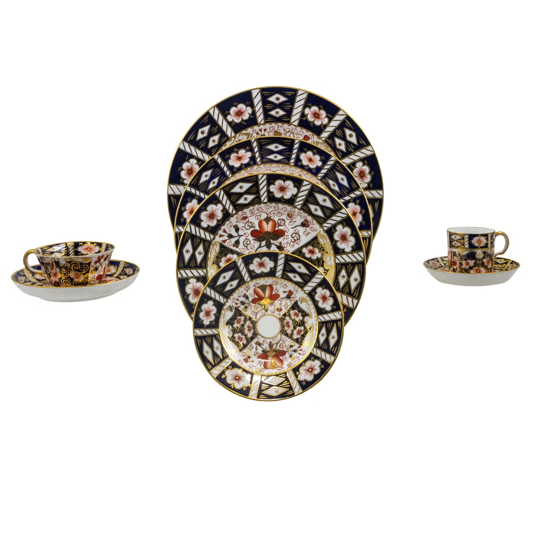 A Royal Crown Derby Imari pattern partial tea service: A Royal Crown Derby porcelain partial dinner service in the 'Traditional Imari' pattern 2451, comprising (15) cups and (15) saucers in various sizes; (4) demitasse cups and (4) saucers; (6) bread & bu