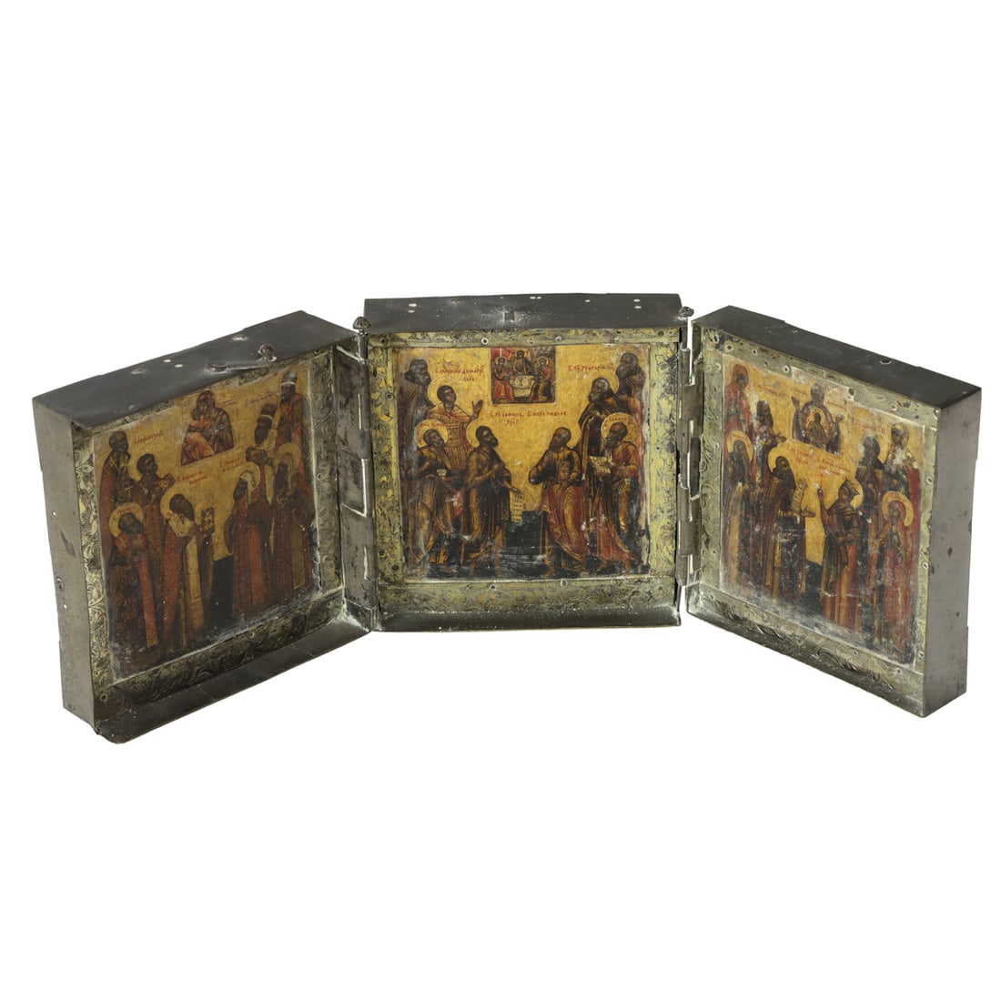 A Russian triptych icon: A Russian triptych icon, likely 19th century, each panel within engraved parcel gilt oklad and frame, 2.25" x 4" x 4" (closed); image: 4" x 4"