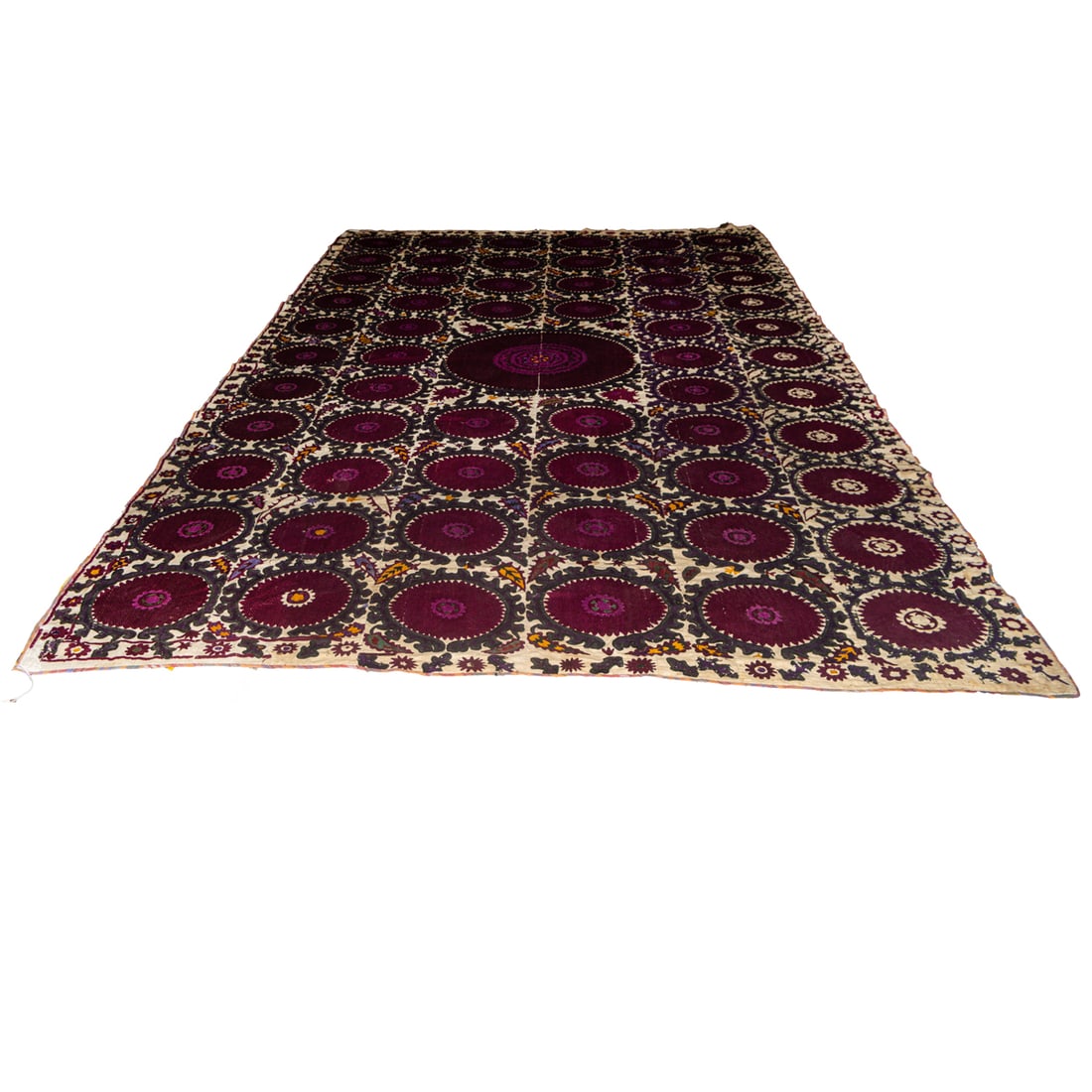 An antique suzani: An antique suzani, circa 1880s, 13'1" x 7'10"