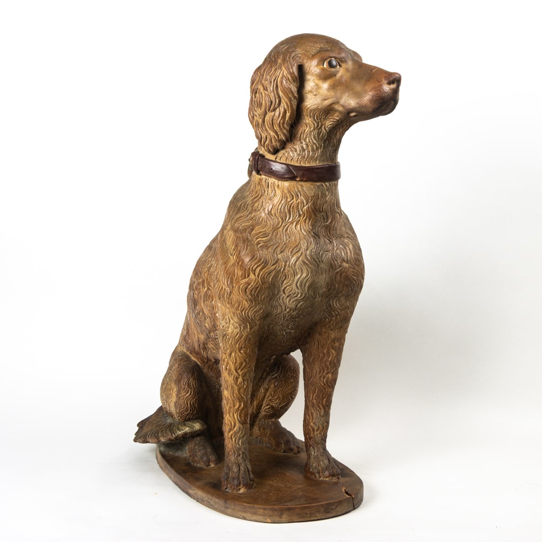 A European terracotta figure of a seated dog, likely English (1 of 3)