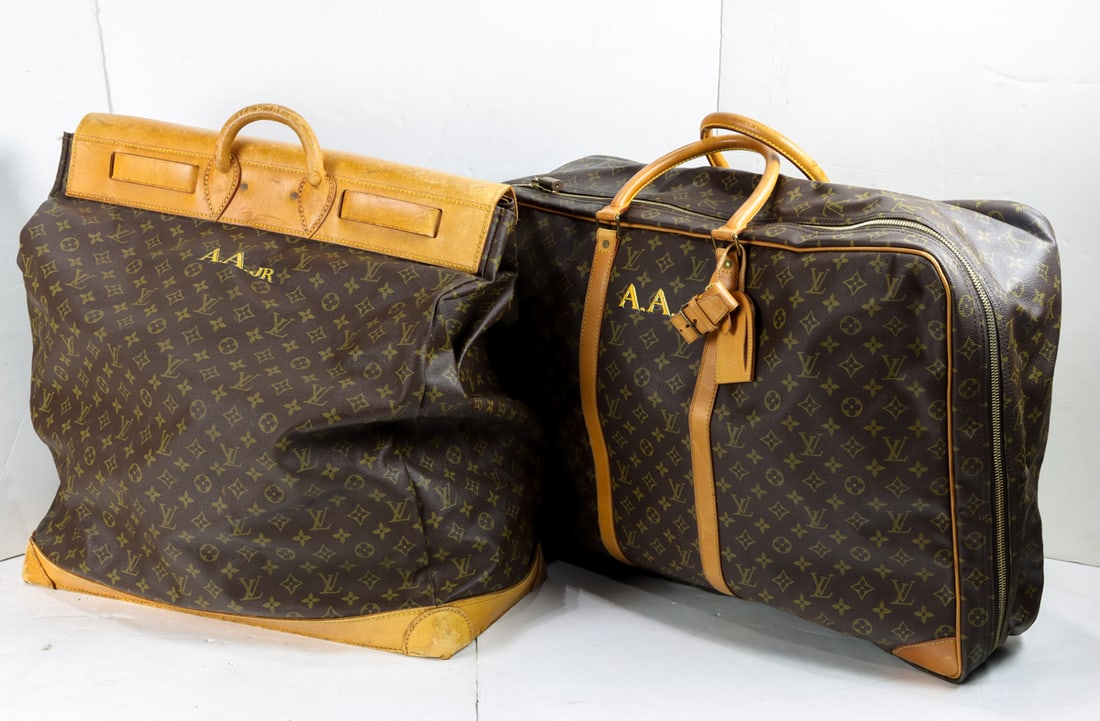 Two pieces of Louis Vuitton monogram canvas soft sided luggage, each with painted 'A: Two pieces of Louis Vuitton monogram canvas soft sided luggage, each with painted 'A.A Jr.' monogram, comprising (1) large suitcase, approx.18"h x 25.5"w x 8"d and (1) steamer bag, currently locked, a