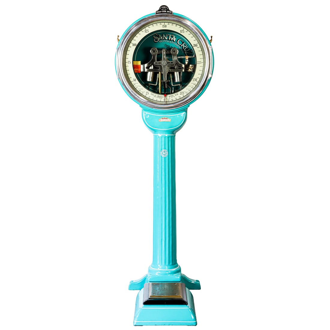 A Watling Mfg. Co. 'Lollipop' penny floor scale: A Watling Mfg. Co. 'Lollipop' penny floor scale, dial inscribed 'Patented in Great Britain, August 10, 1925, Pat. No. 23810, Made by Watling Mfg. Co., Chicago, Il', back plate inscribed 'Santa Cruz Be