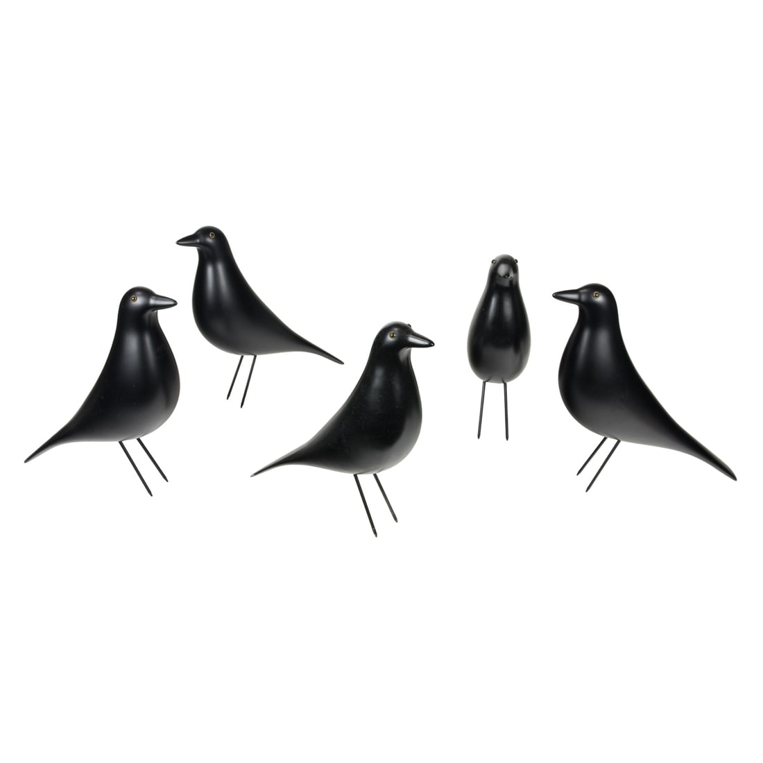 A group of five Vitra Design Museum Eames House Birds: A group of five Vitra Design Museum Eames House Birds, each ebonized example with glass eyes and factory label, 10"h x 15"l