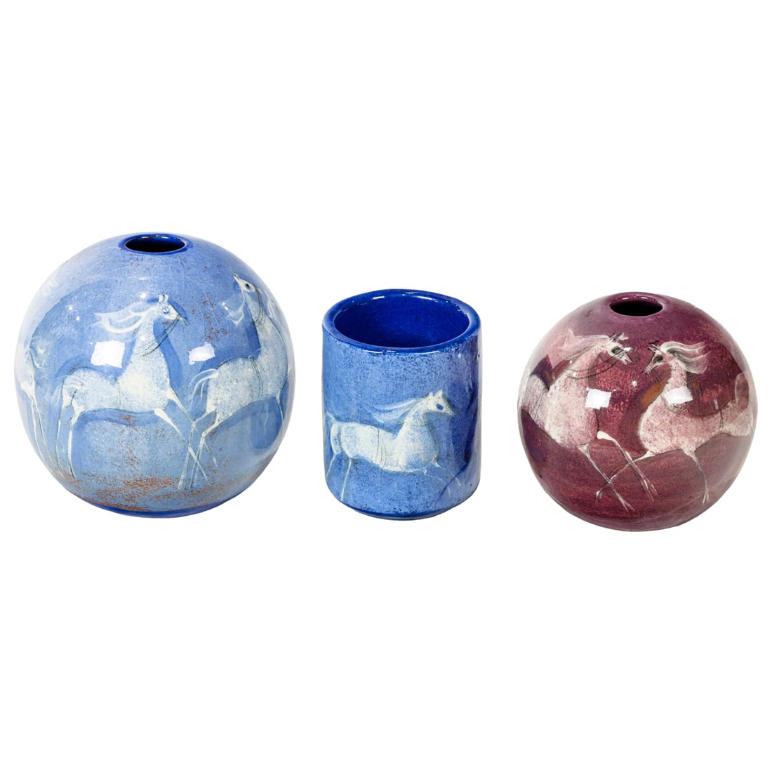 Three Polia Pillin (1909-1992: Three Polia Pillin (1909-1992, Los Angeles) glazed earthenware vessels, each signed, and decorated with horses, comprising (2) globular vases, 5"h and 4.5"h and a cup, 4"h