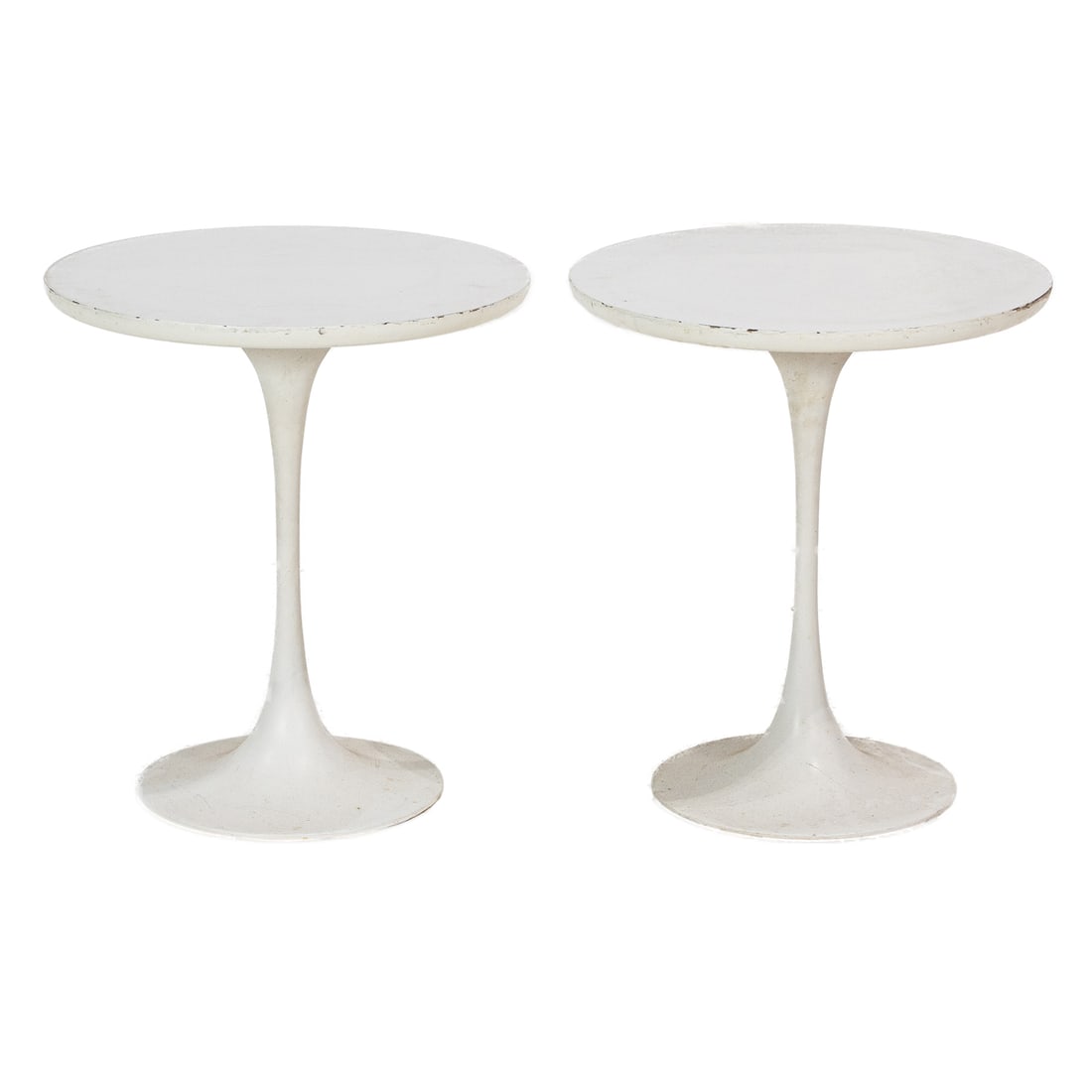 A pair of Burke tulip side tables: A pair of Burke tulip side tables, each with laminate top on white base, unmarked, 20"h x 17.75"dia