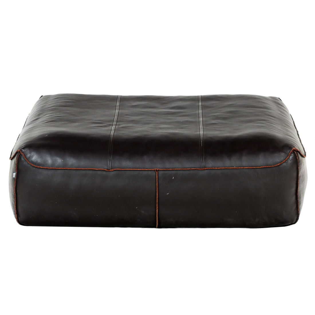 A German Rolf Benz espresso leather pouf: A German Rolf Benz espresso leather pouf, of rectangular form with exposed stitching, and retains label, 12"h x 38" square