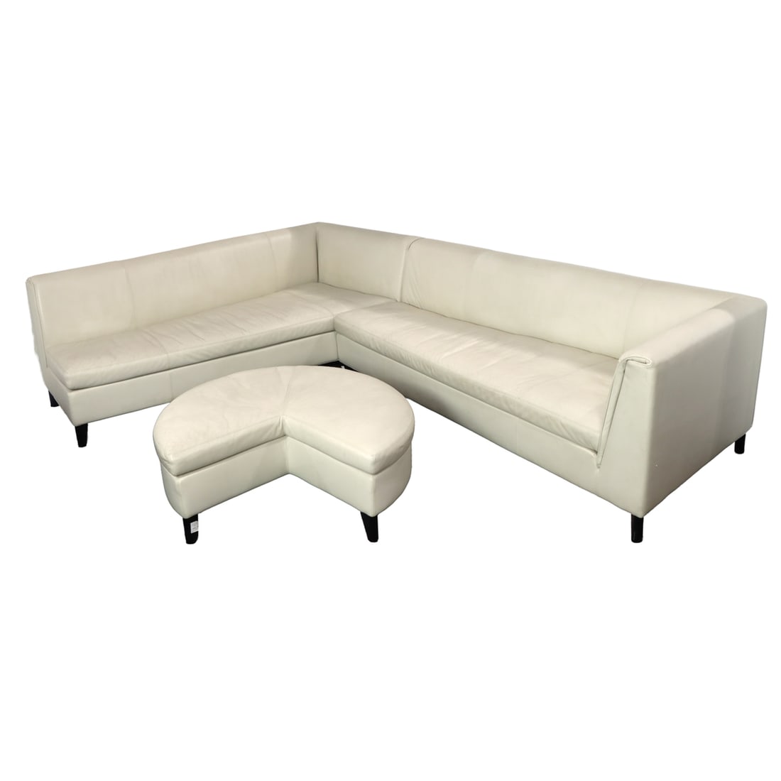 A Paolo Piva for Wittmann leather upholstered 'Grandangolo' two-section modular sofa and ottoman (1 of 7)