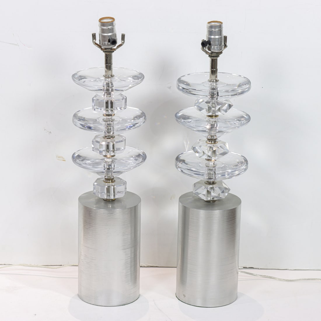A pair of Modern brushed steel and glass table lamps (1 of 3)