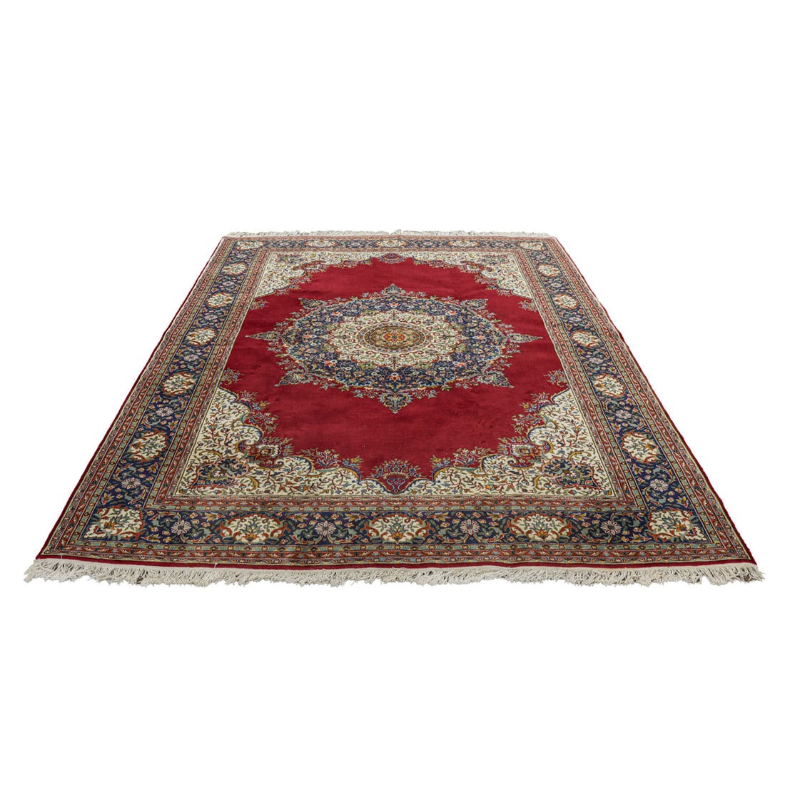 A Persian Kerman carpet: A Persian Kerman carpet, 8' x10'6"