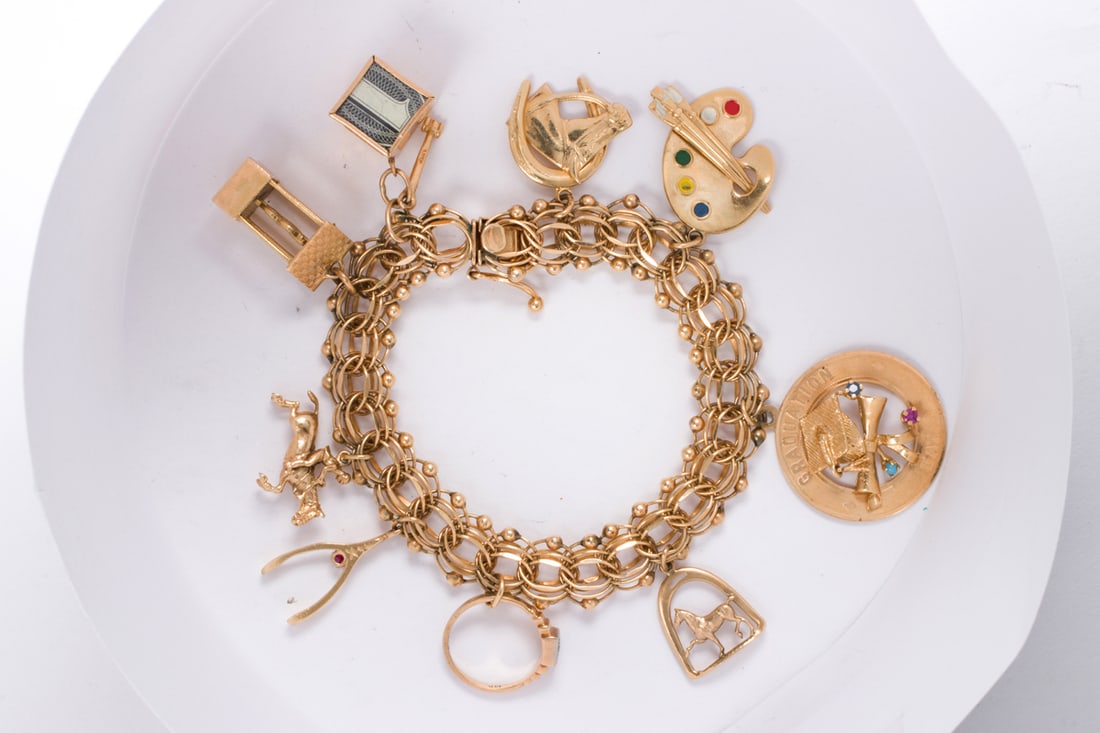A 14k gold charm bracelet (1 of 2)