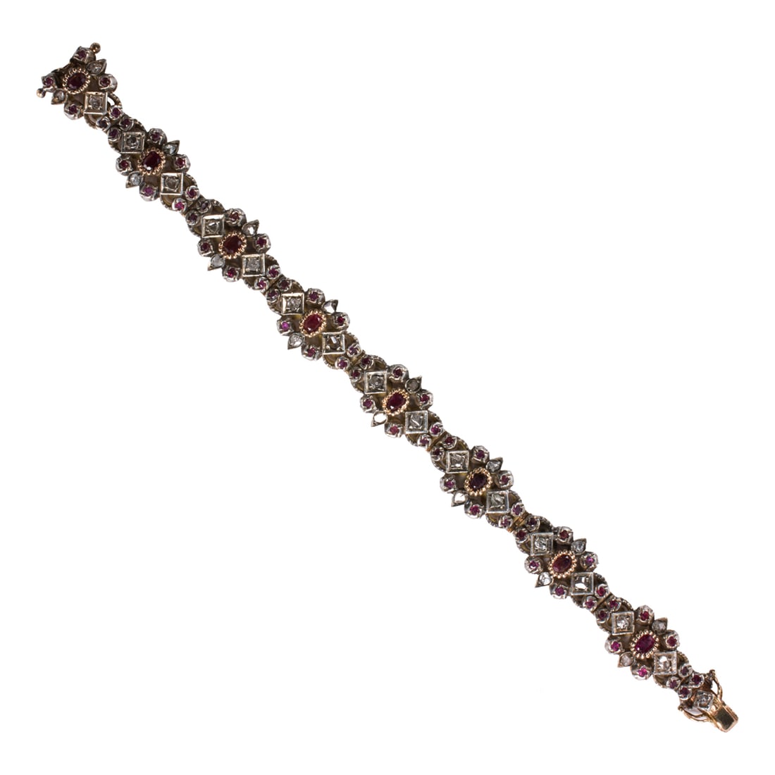 A ruby, diamond, and silver-topped 18k gold bracelet (1 of 2)